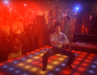 John travolta on dance floor in saturday night fever scene